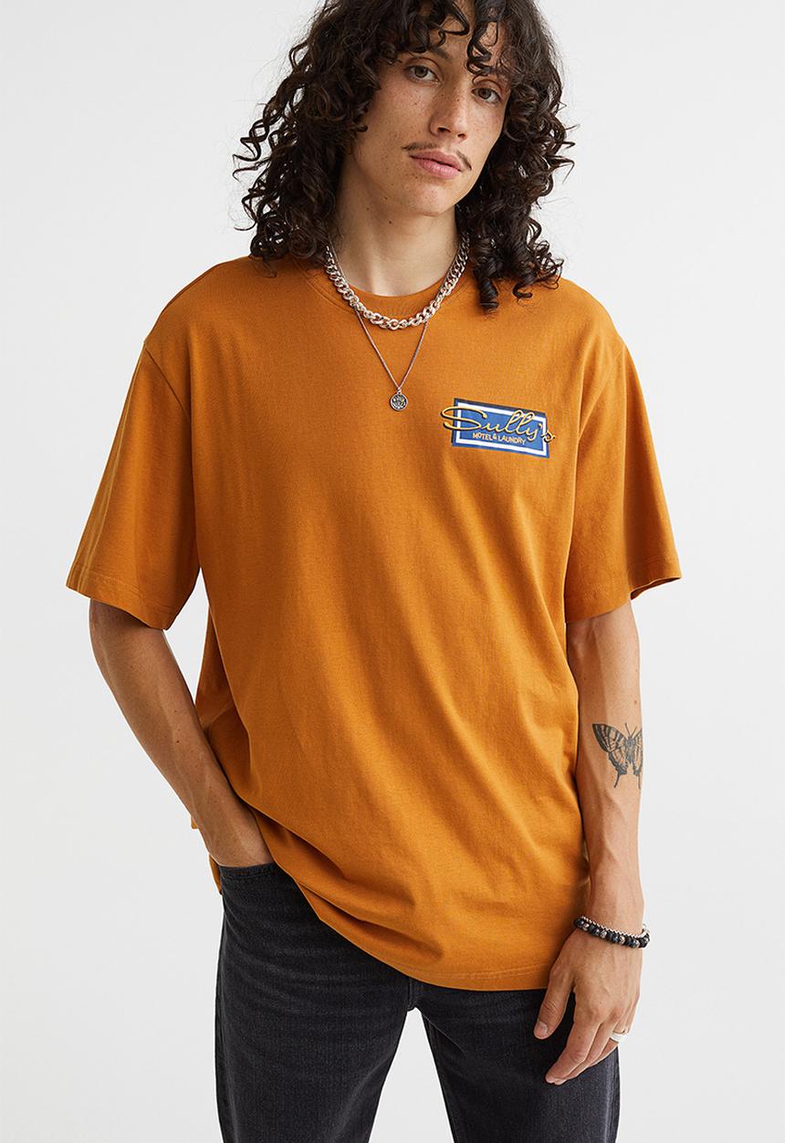 H&M - Relaxed fit printed T-shirt - mustard yellow/sully's