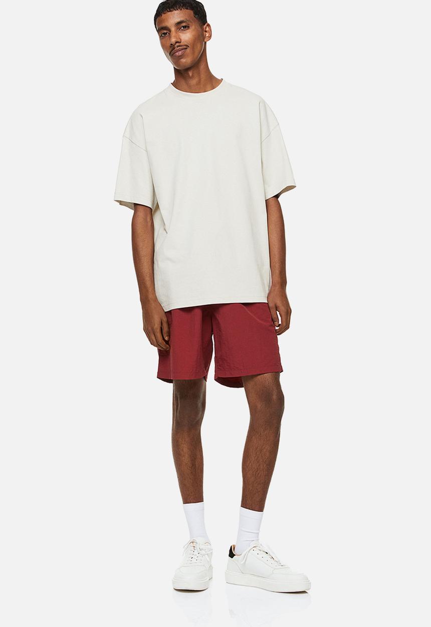 H&M - Relaxed fit nylon shorts - red