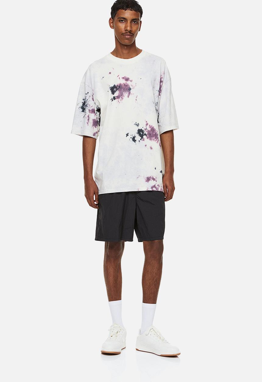 H&M - Relaxed fit belted nylon shorts - black