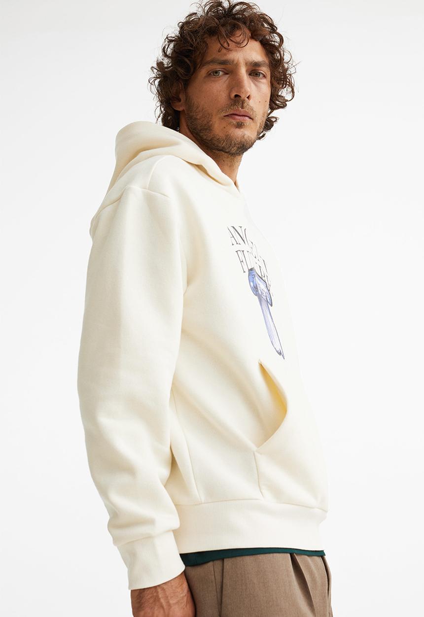 H&M - Relaxed fit hoodie - cream/ancient future