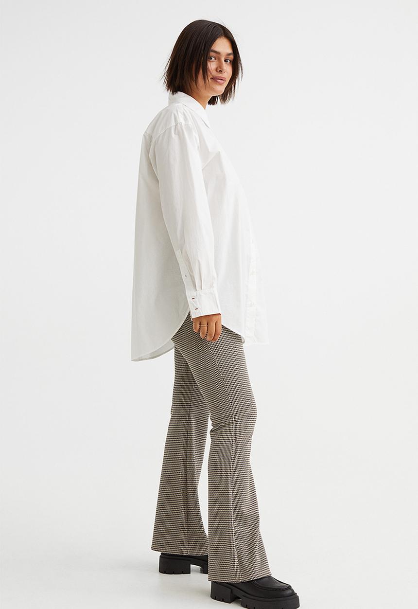 H&M - Flared leggings - beige/dogtooth-patterned