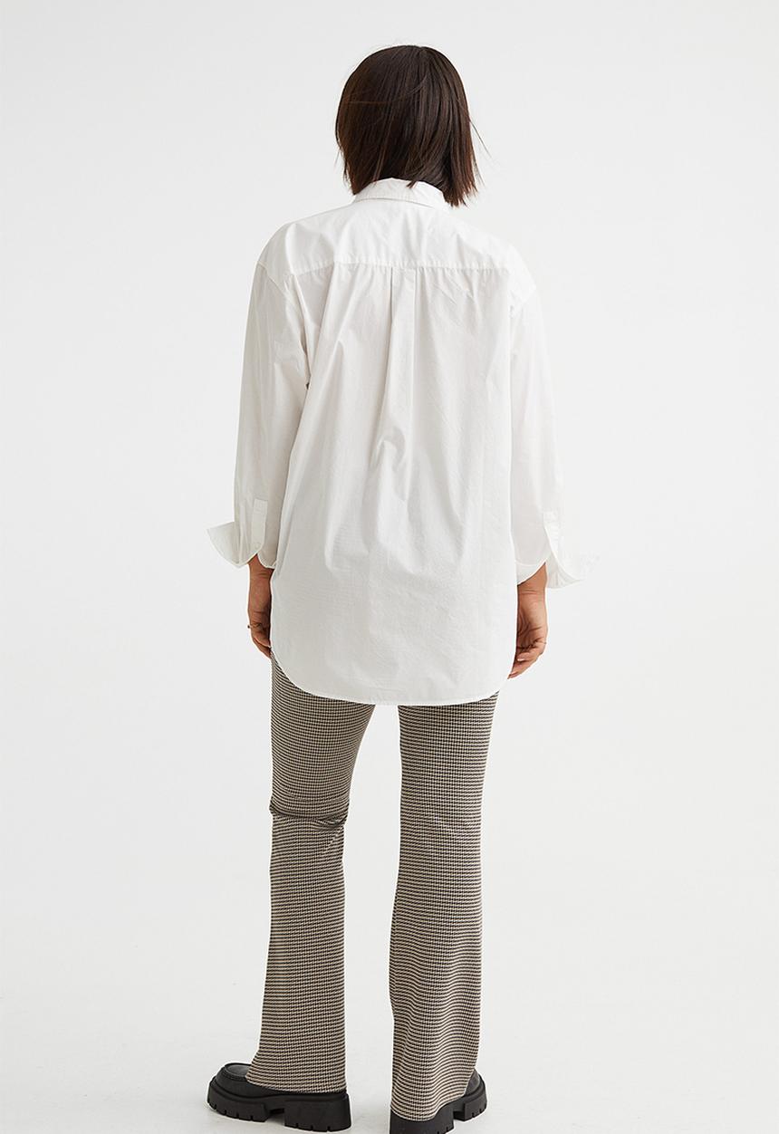 H&M - Flared leggings - beige/dogtooth-patterned
