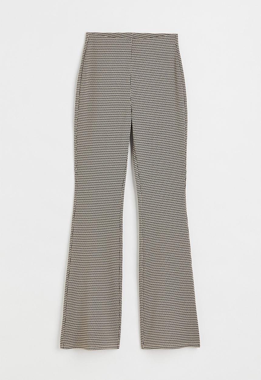 H&M - Flared leggings - beige/dogtooth-patterned