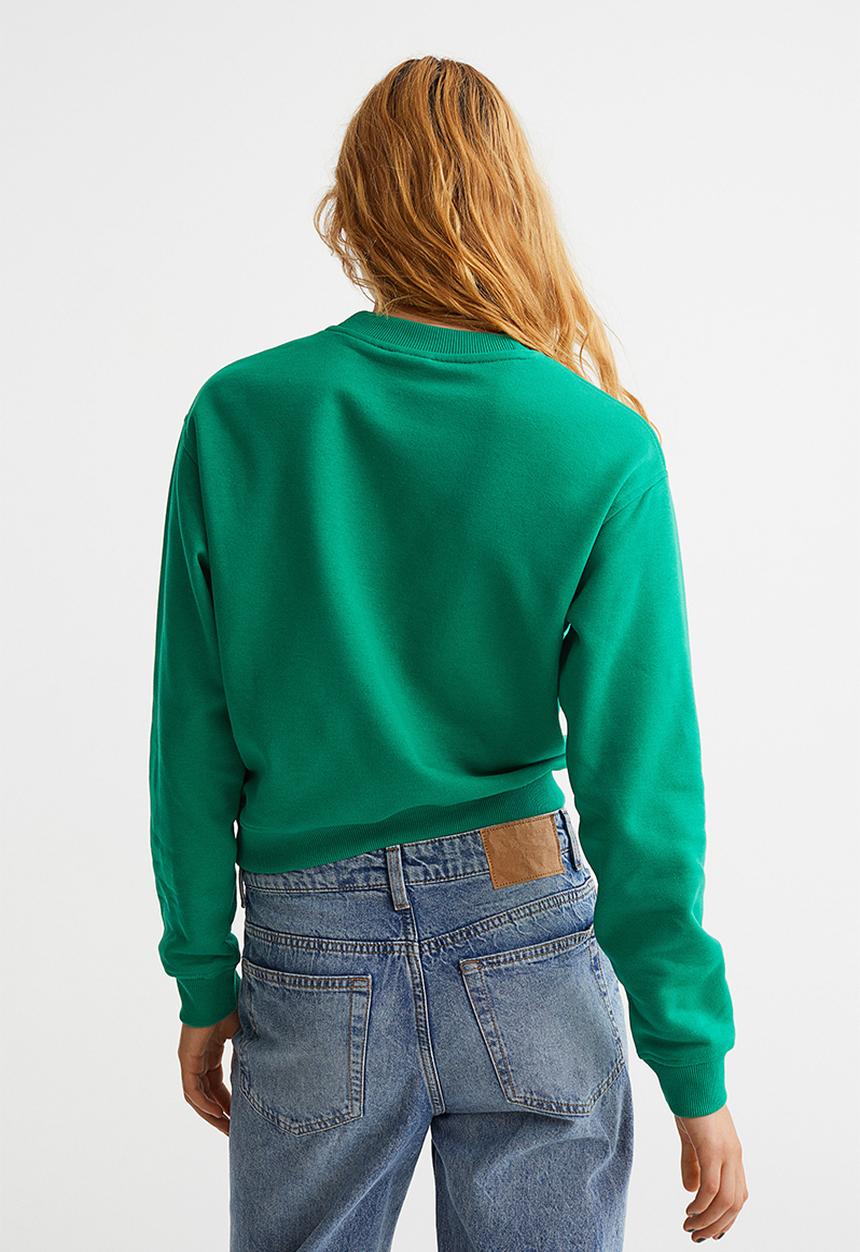 H&M - Printed sweatshirt - bright green/playoffs