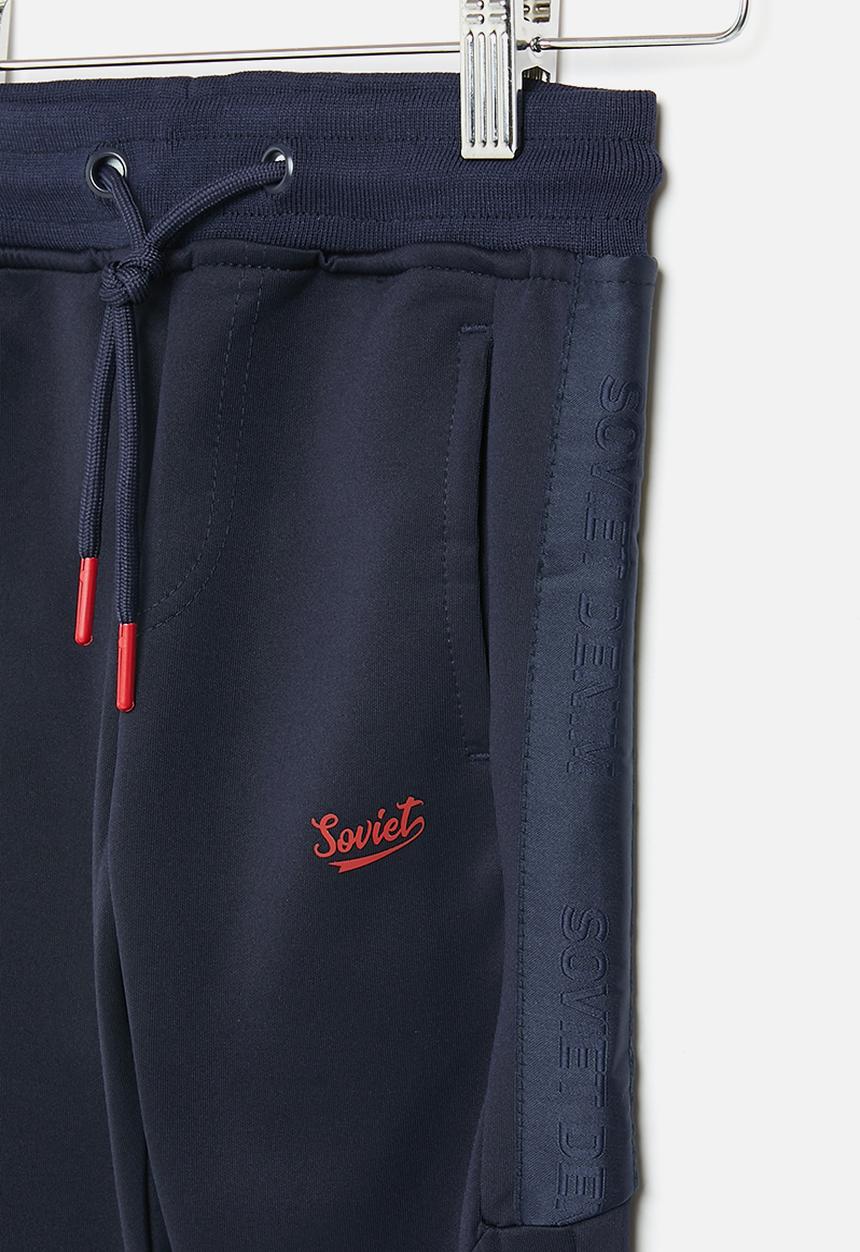 SOVIET - Track pants - navy