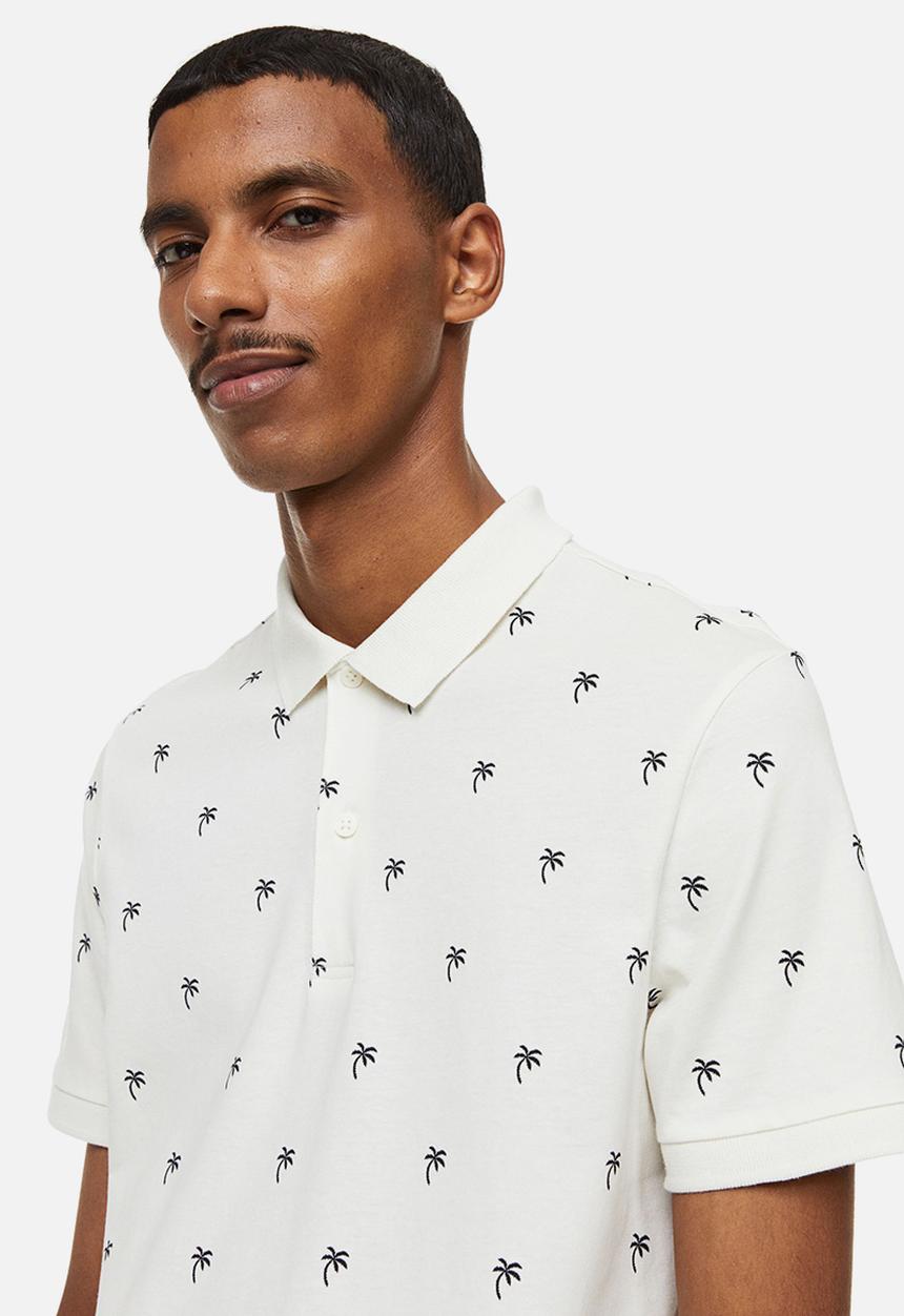 H&M - Slim fit patterned polo shirt - cream/palm trees