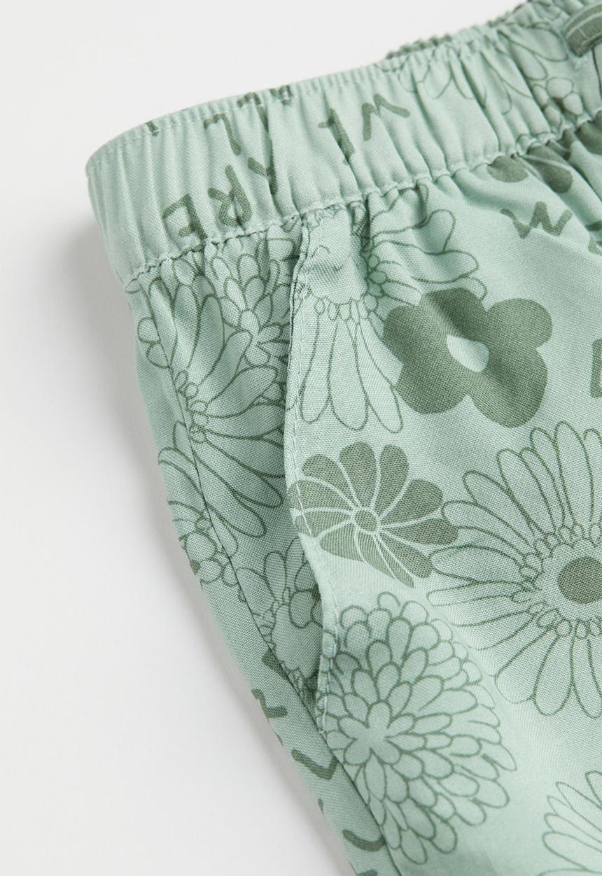H&M - Woven joggers - mint green/flowers