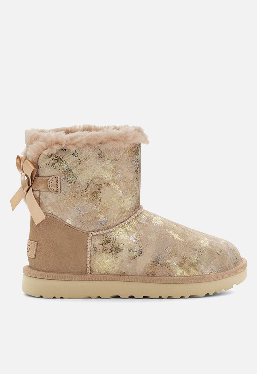 UGG® - Mini bailey bow gold wash - beachwood