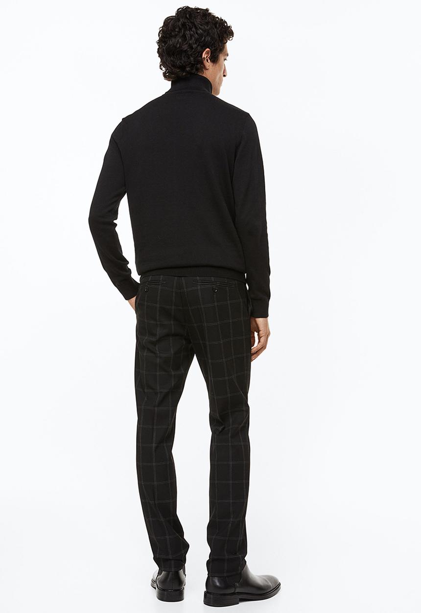 H&M - Slim fit trousers - black/checked