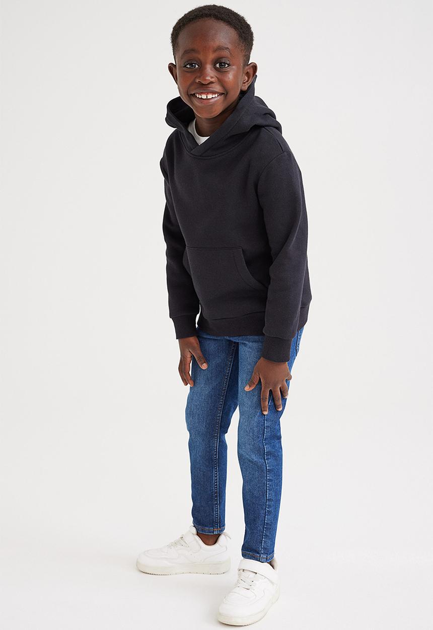 H&M - Superstretch relaxed tapered fit jeans - dark denim blue