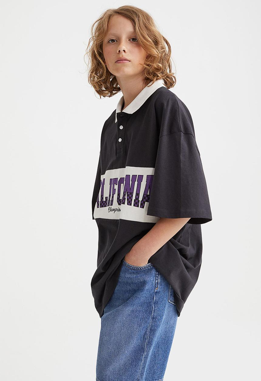 H&M - Printed polo shirt - black/california