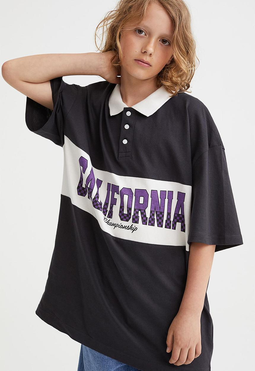 H&M - Printed polo shirt - black/california