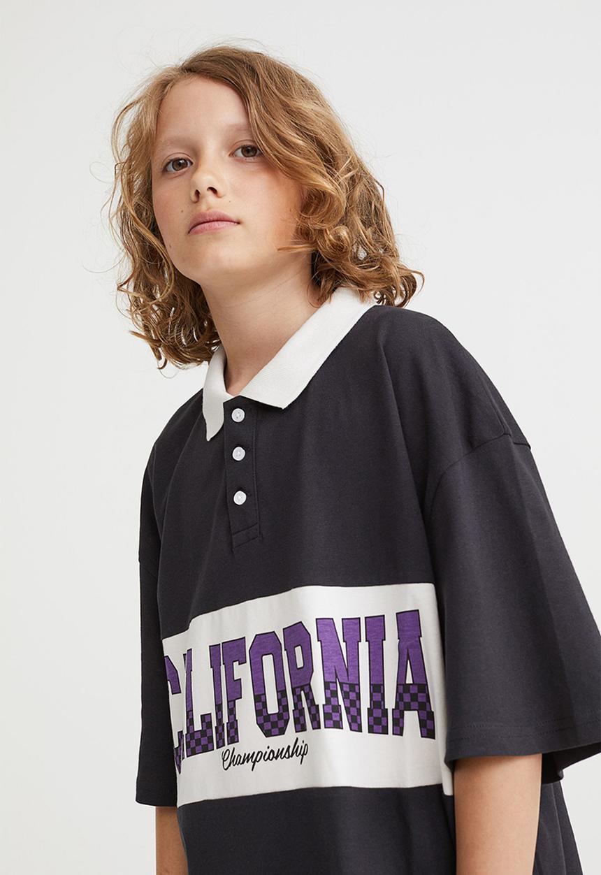 H&M - Printed polo shirt - black/california