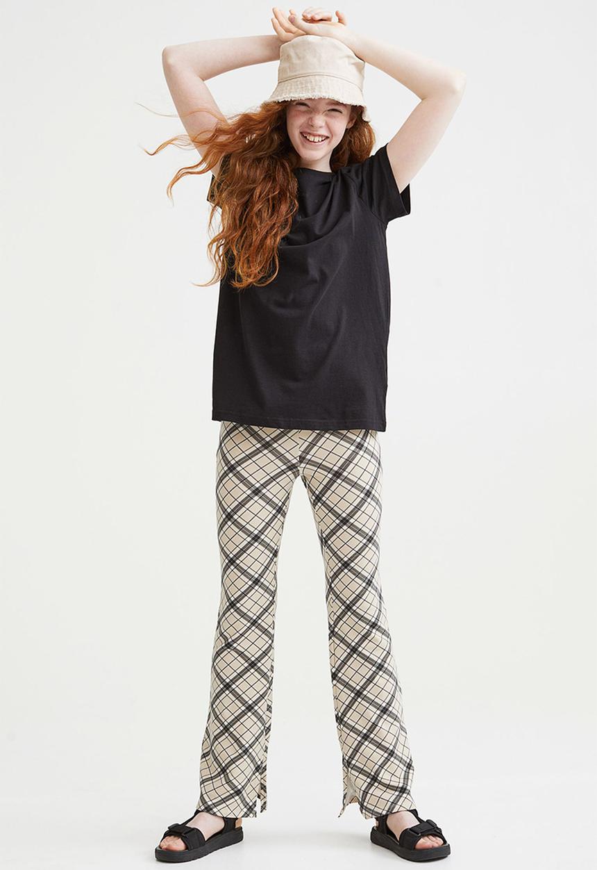 H&M - Flared leggings - beige/checked