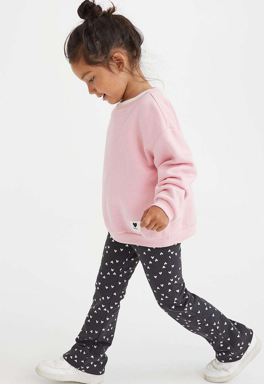 H&M - Flared leggings - black/hearts