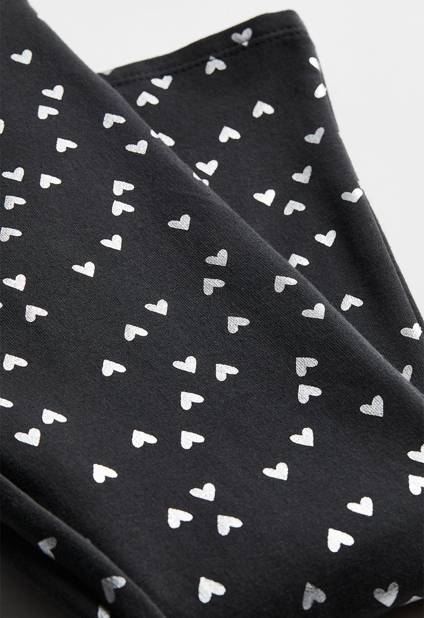 H&M - Flared leggings - black/hearts