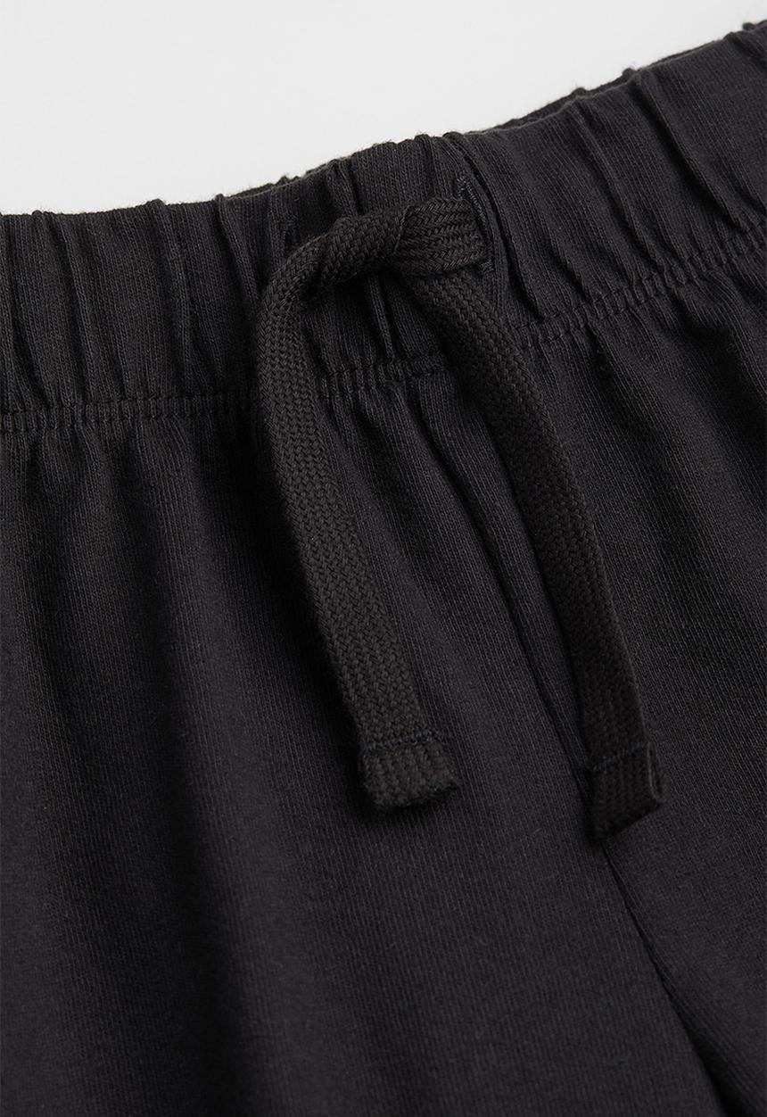 H&M - Jersey shorts - black/enjoy today