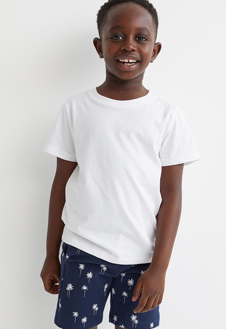 H&M - Sweatshirt shorts - navy blue/palm trees