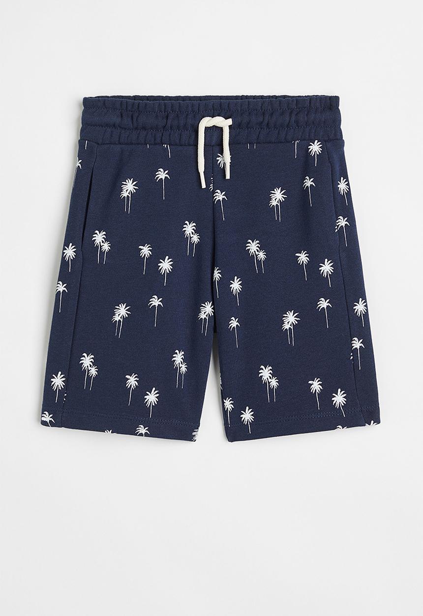 H&M - Sweatshirt shorts - navy blue/palm trees