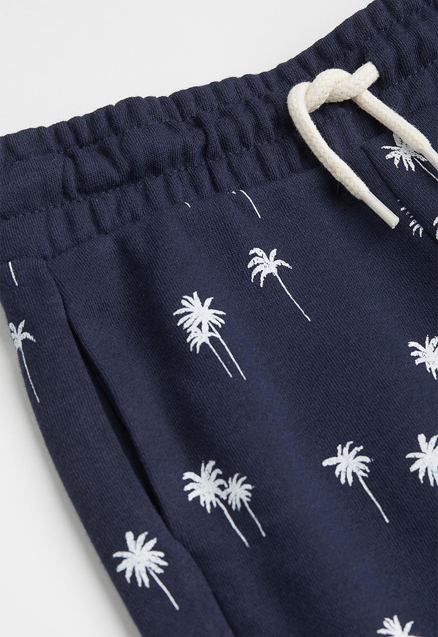 H&M - Sweatshirt shorts - navy blue/palm trees