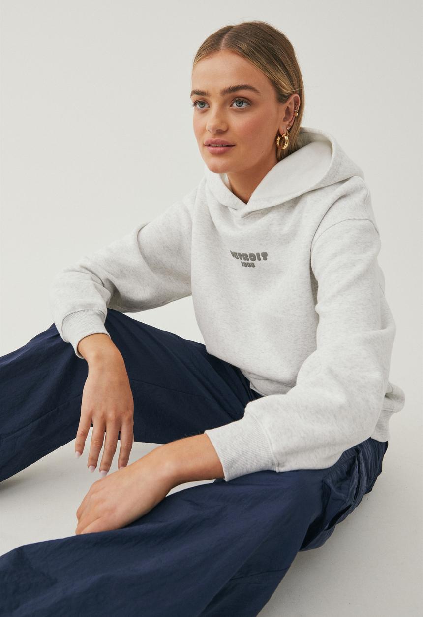 Supré  - Paige oversized printed hoodie - light grey marle/detroit