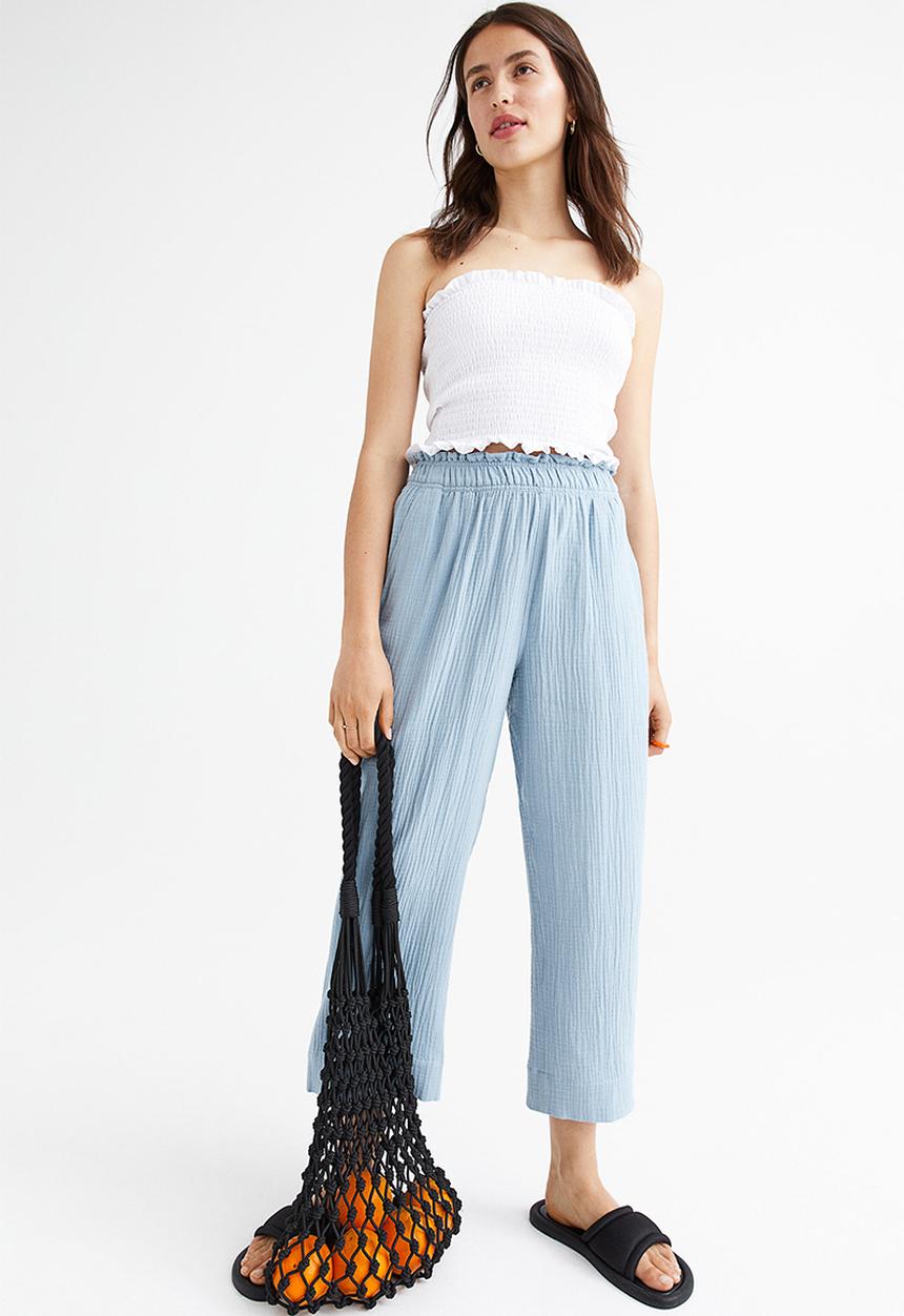 H&M - Crinkled cotton trousers - light blue