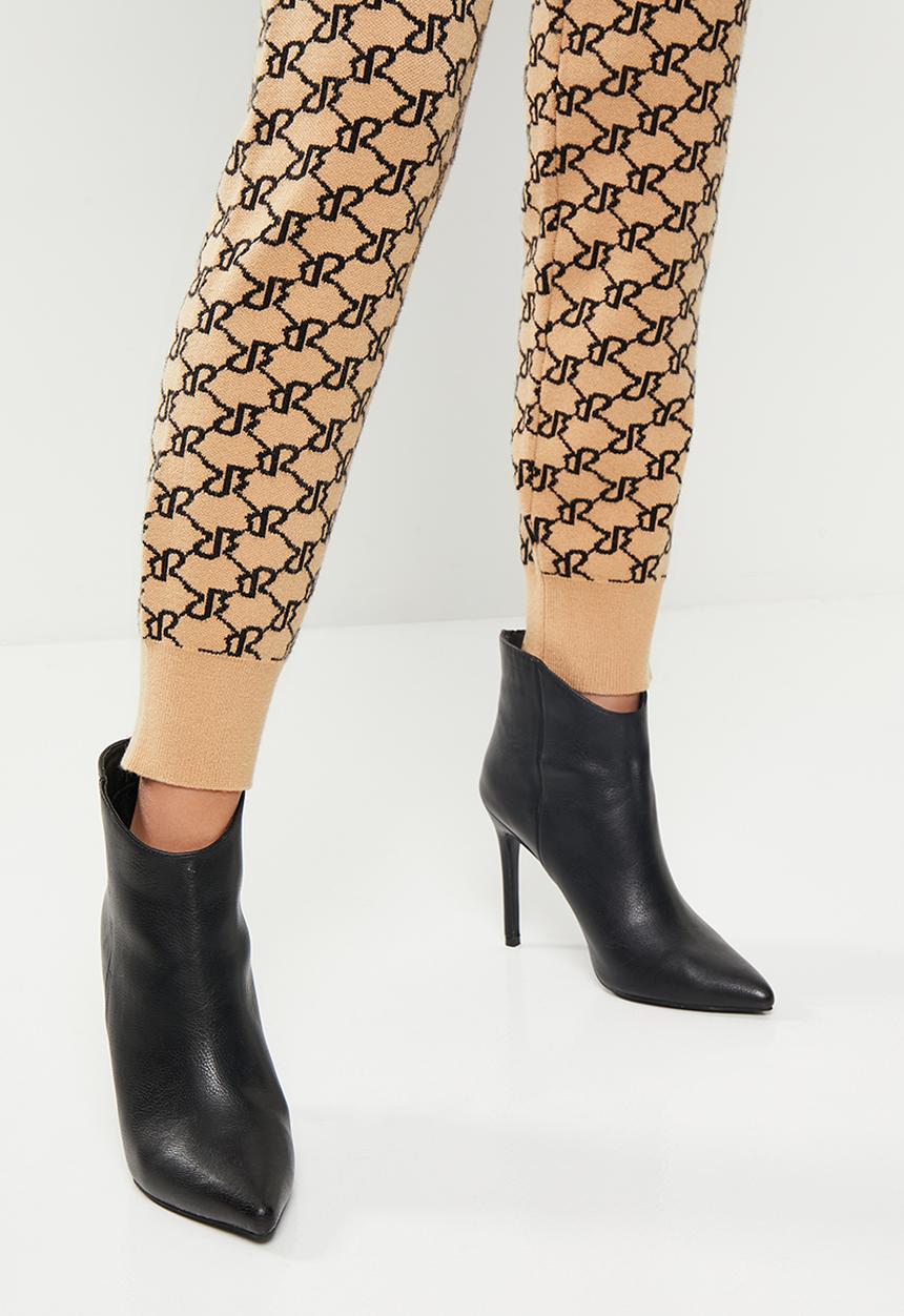 SISSY BOY - Willema fitted, ankle-length sweatpants - stone & black
