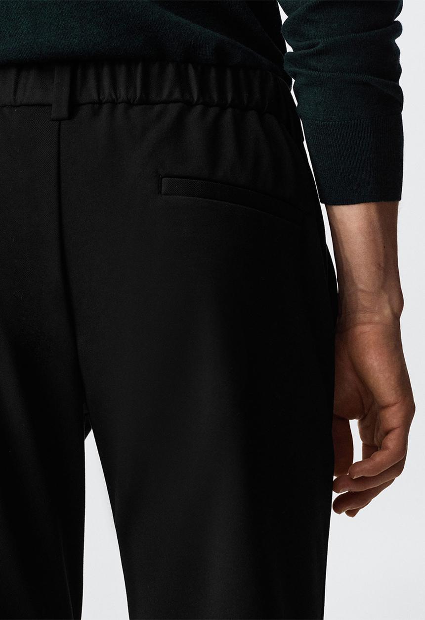 MANGO - Trousers agave - black