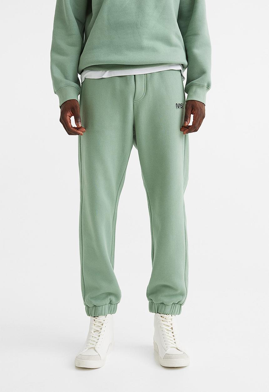 H&M - Relaxed fit sweatpants -  light green/nasa