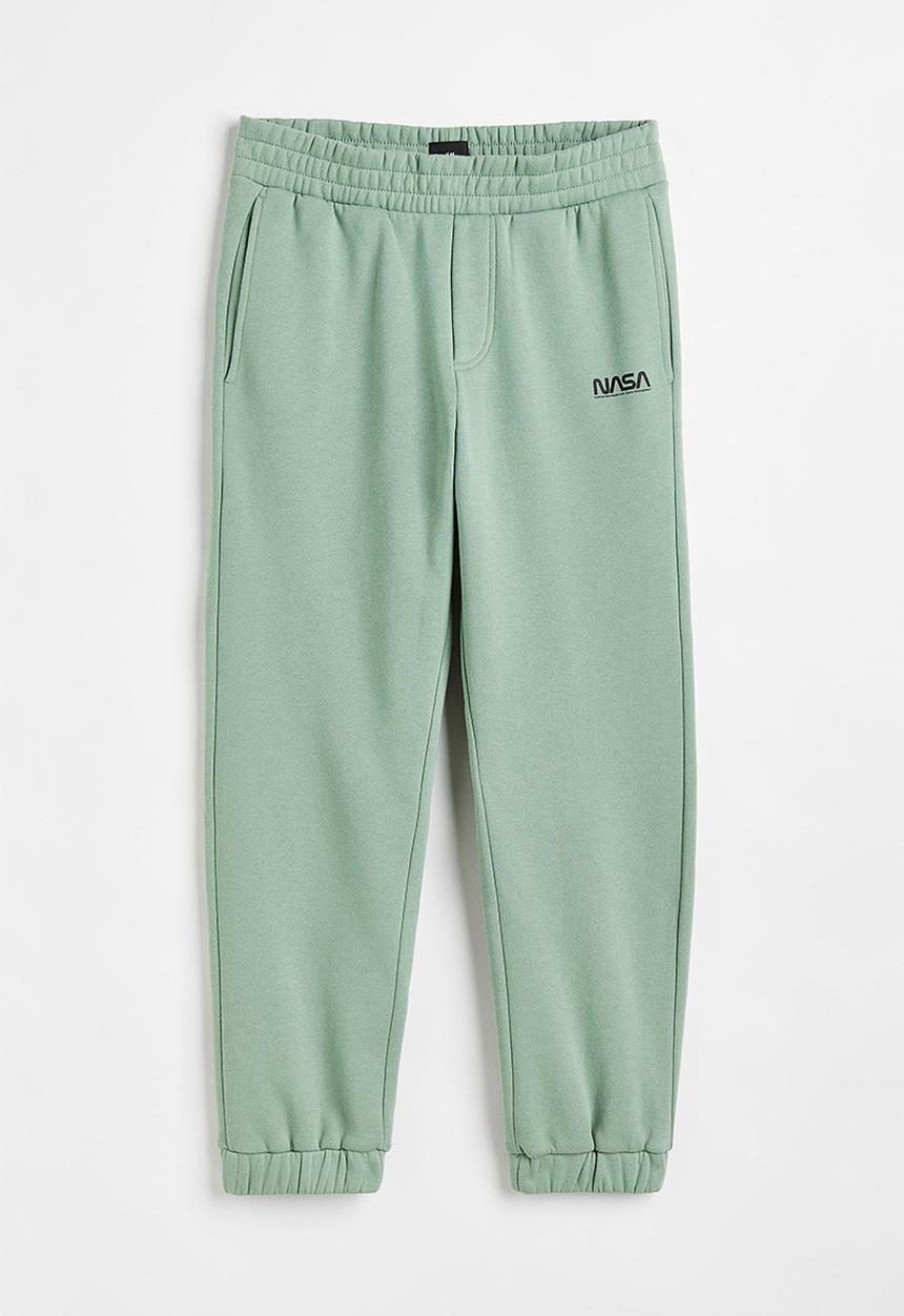 H&M - Relaxed fit sweatpants -  light green/nasa