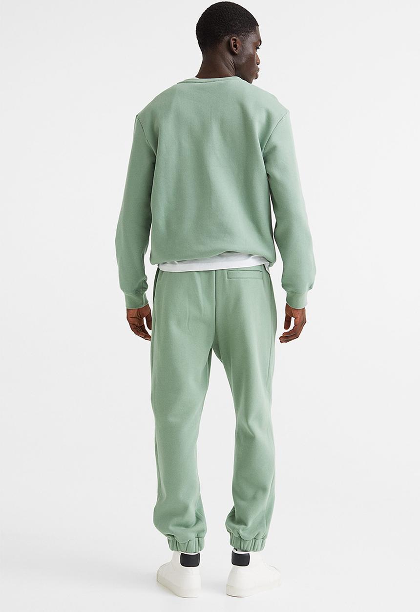 H&M - Relaxed fit sweatpants -  light green/nasa