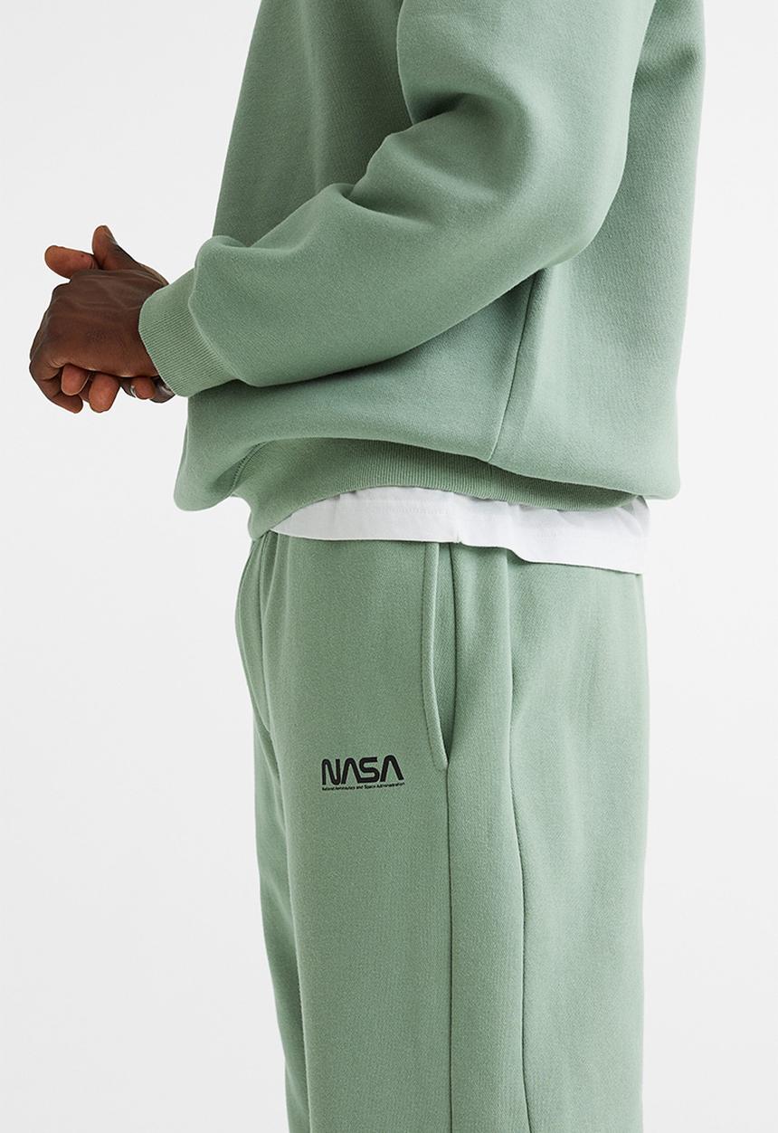 H&M - Relaxed fit sweatpants -  light green/nasa