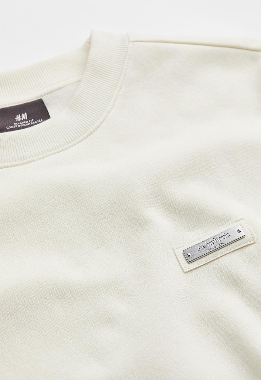 H&M - Relaxed fit appliquéd sweatshirt - cream