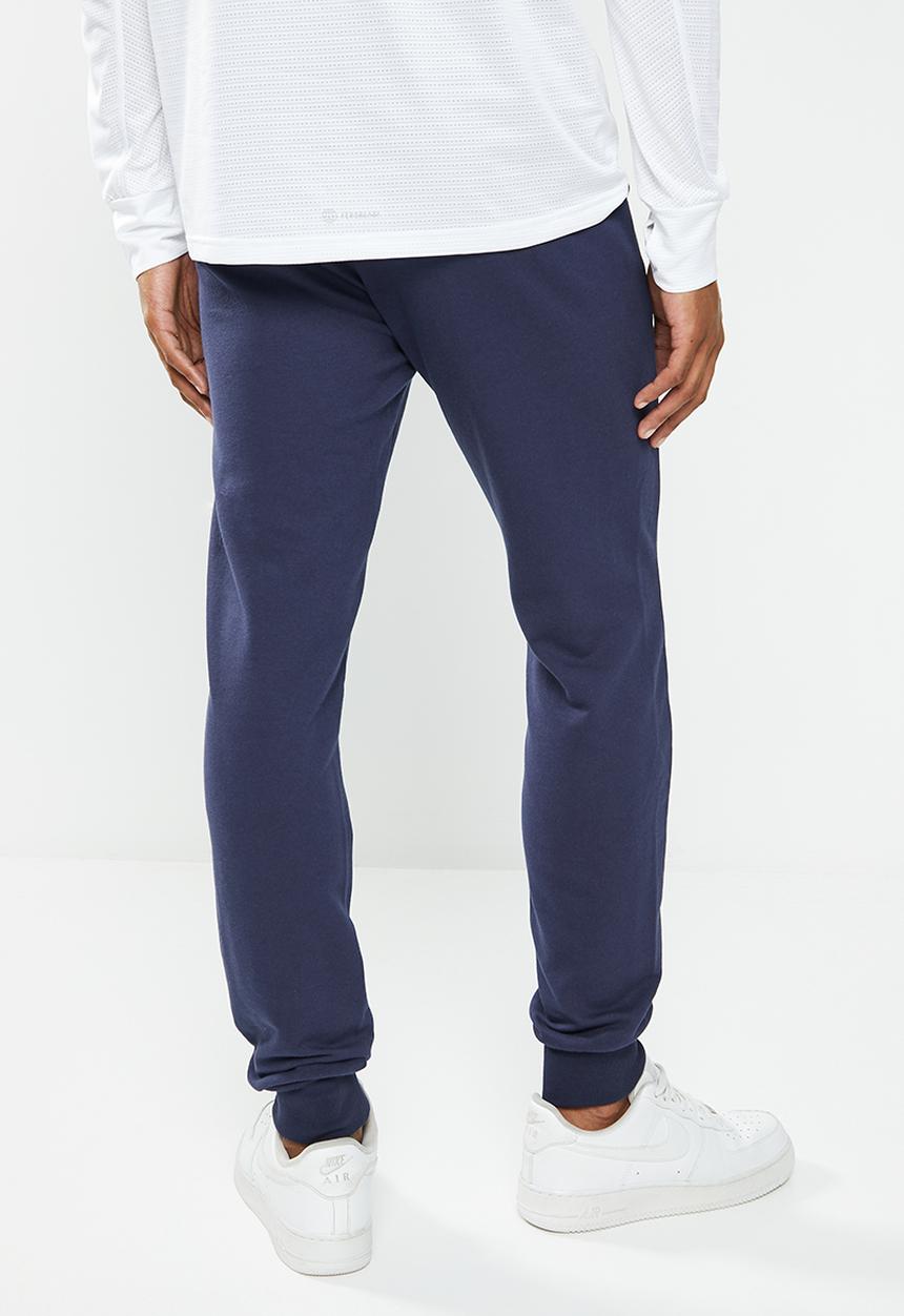 PUMA - Ess slim pants tr - peacoat