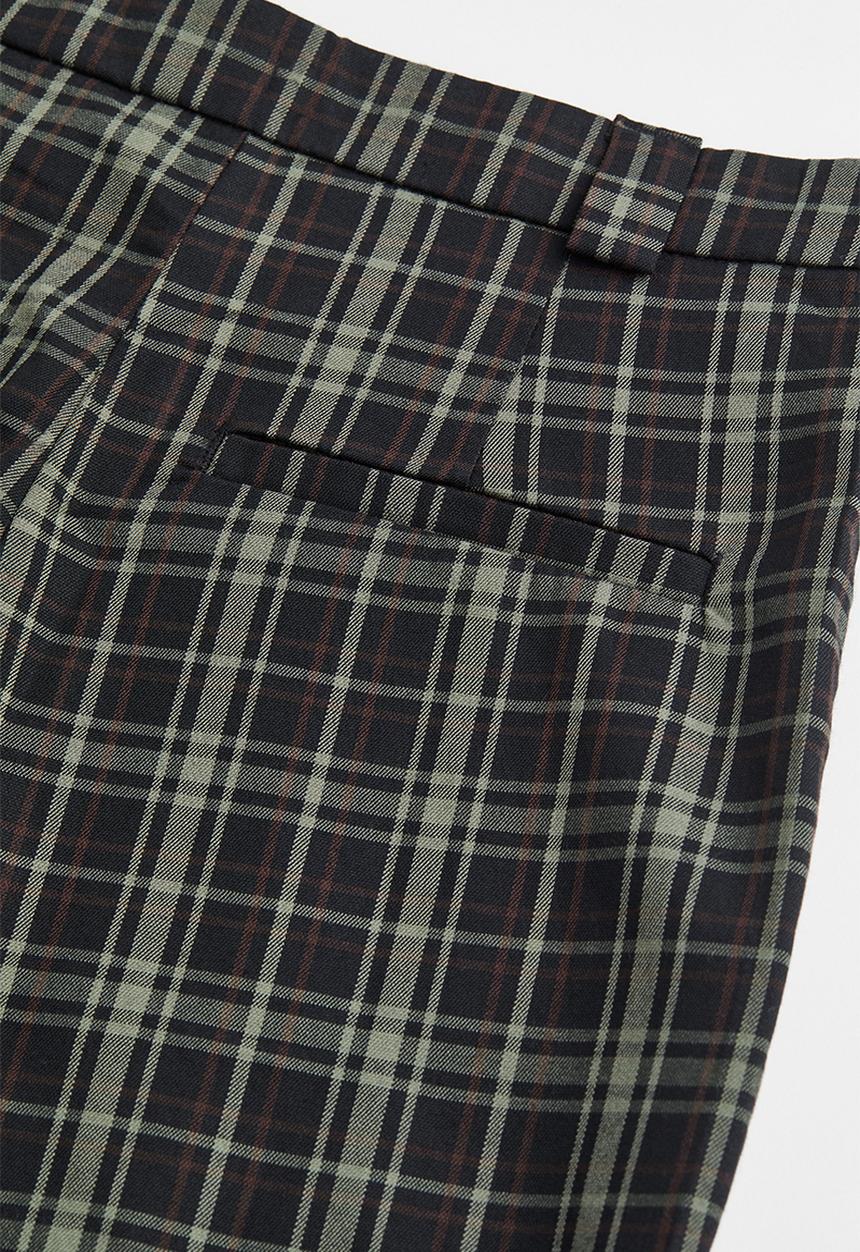 H&M - Flared tailored trousers - black/checked