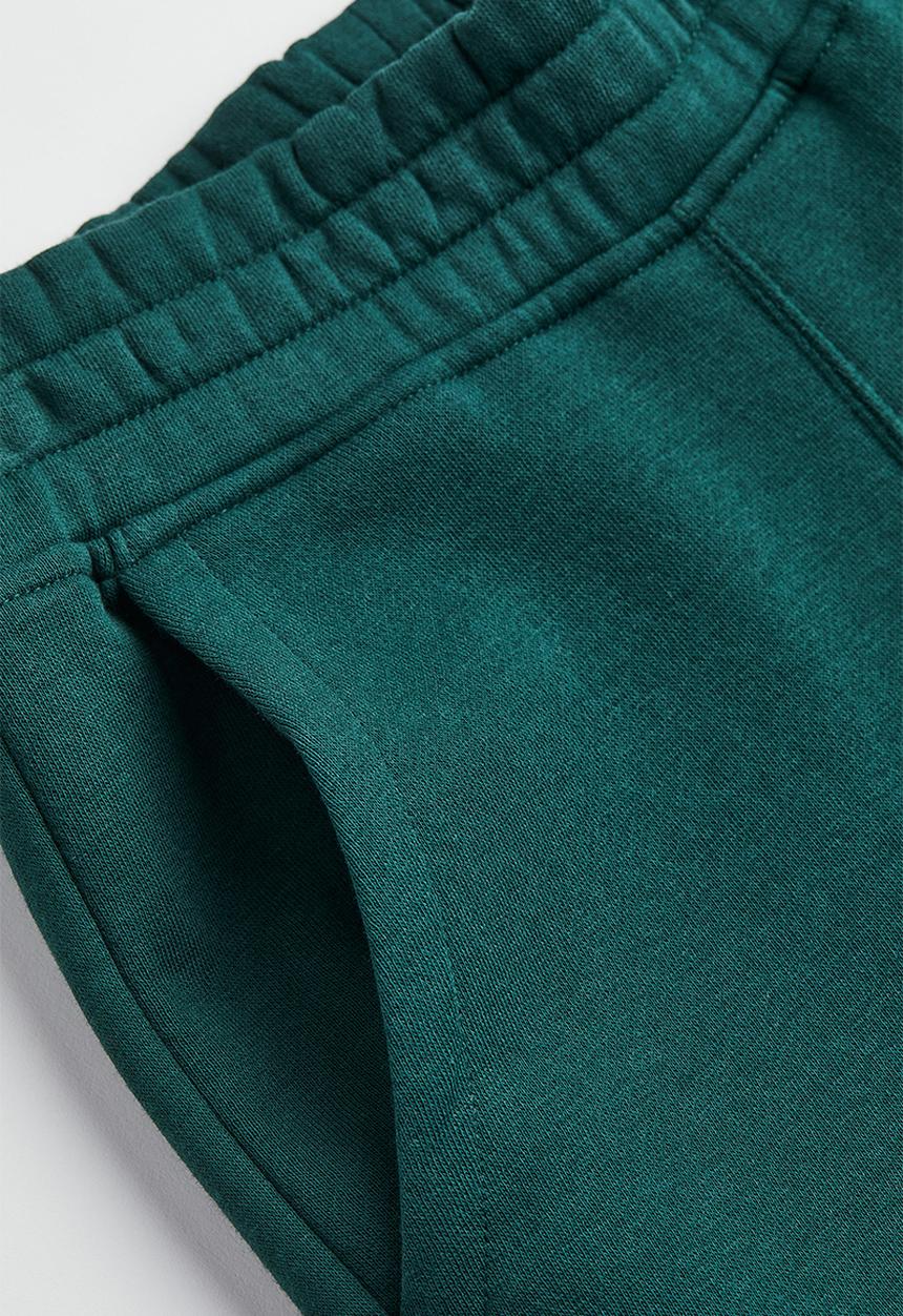H&M - Printed joggers - dark green/harry potter