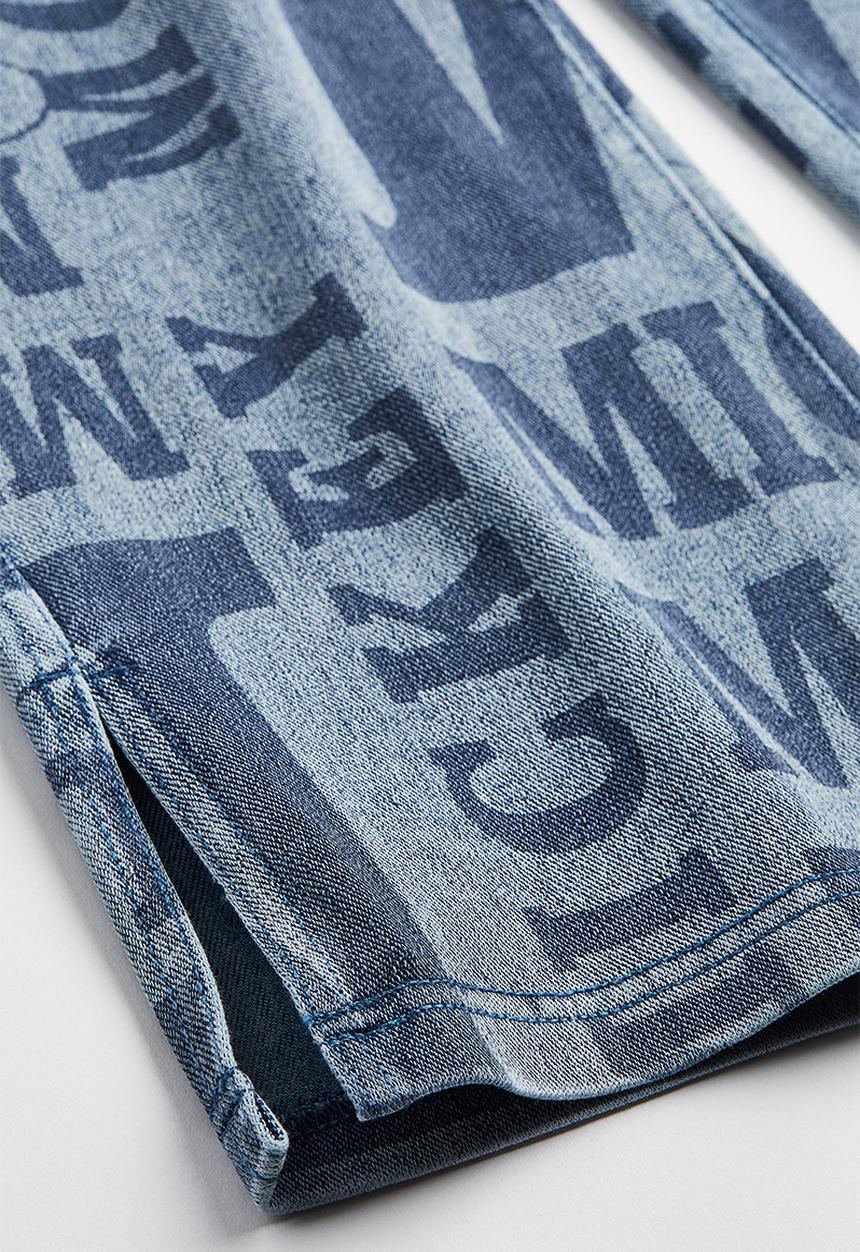 H&M - Wide printed jeggings - denim blue/mickey mouse