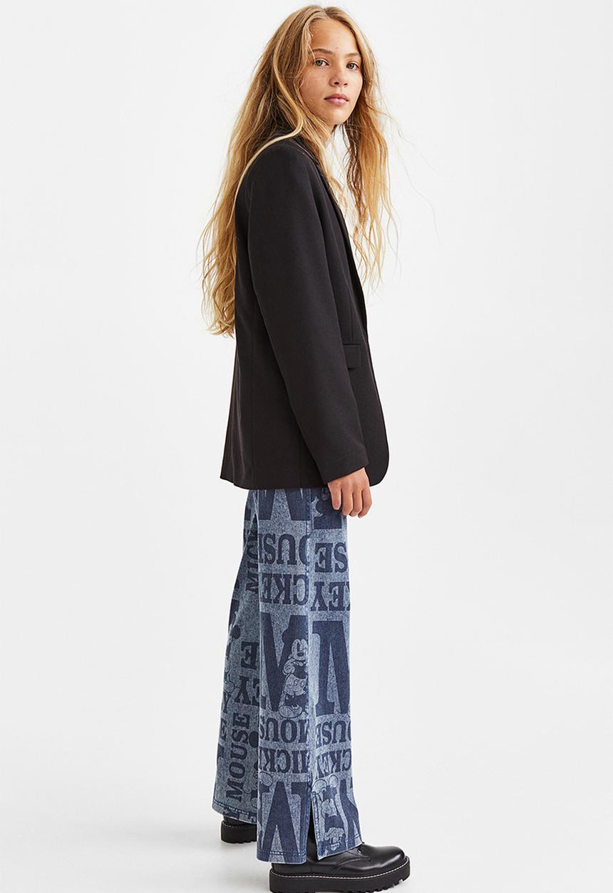 H&M - Wide printed jeggings - denim blue/mickey mouse