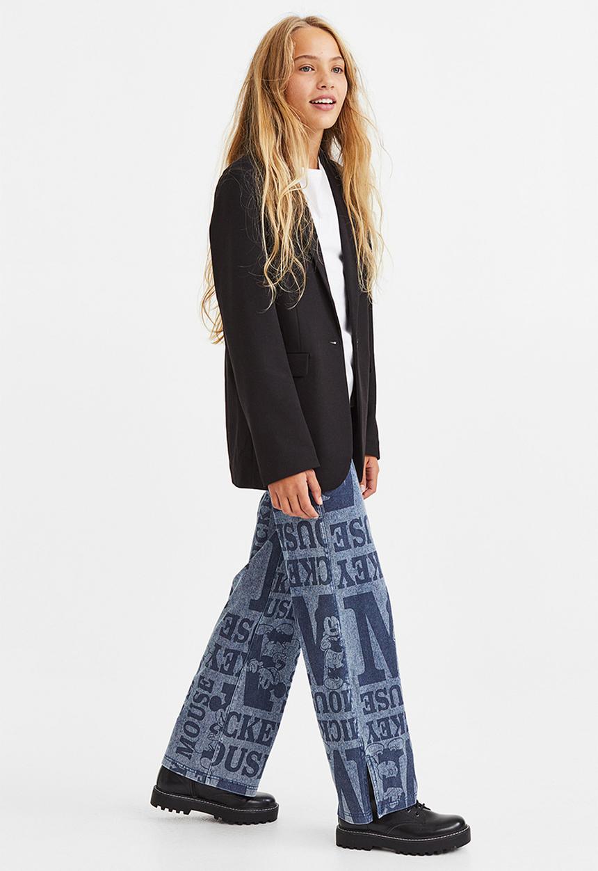 H&M - Wide printed jeggings - denim blue/mickey mouse