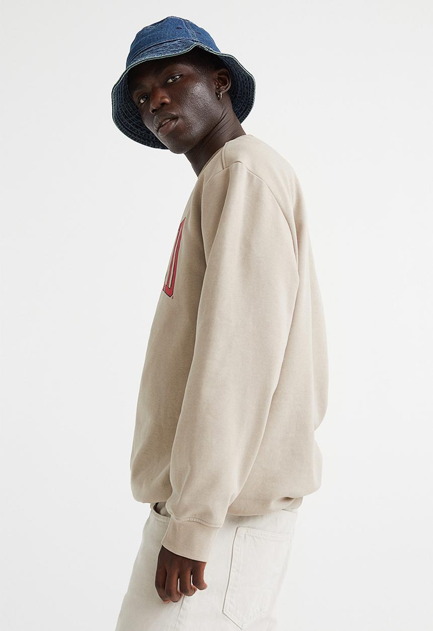 H&M - Regular fit printed sweatshirt - beige/harvard university