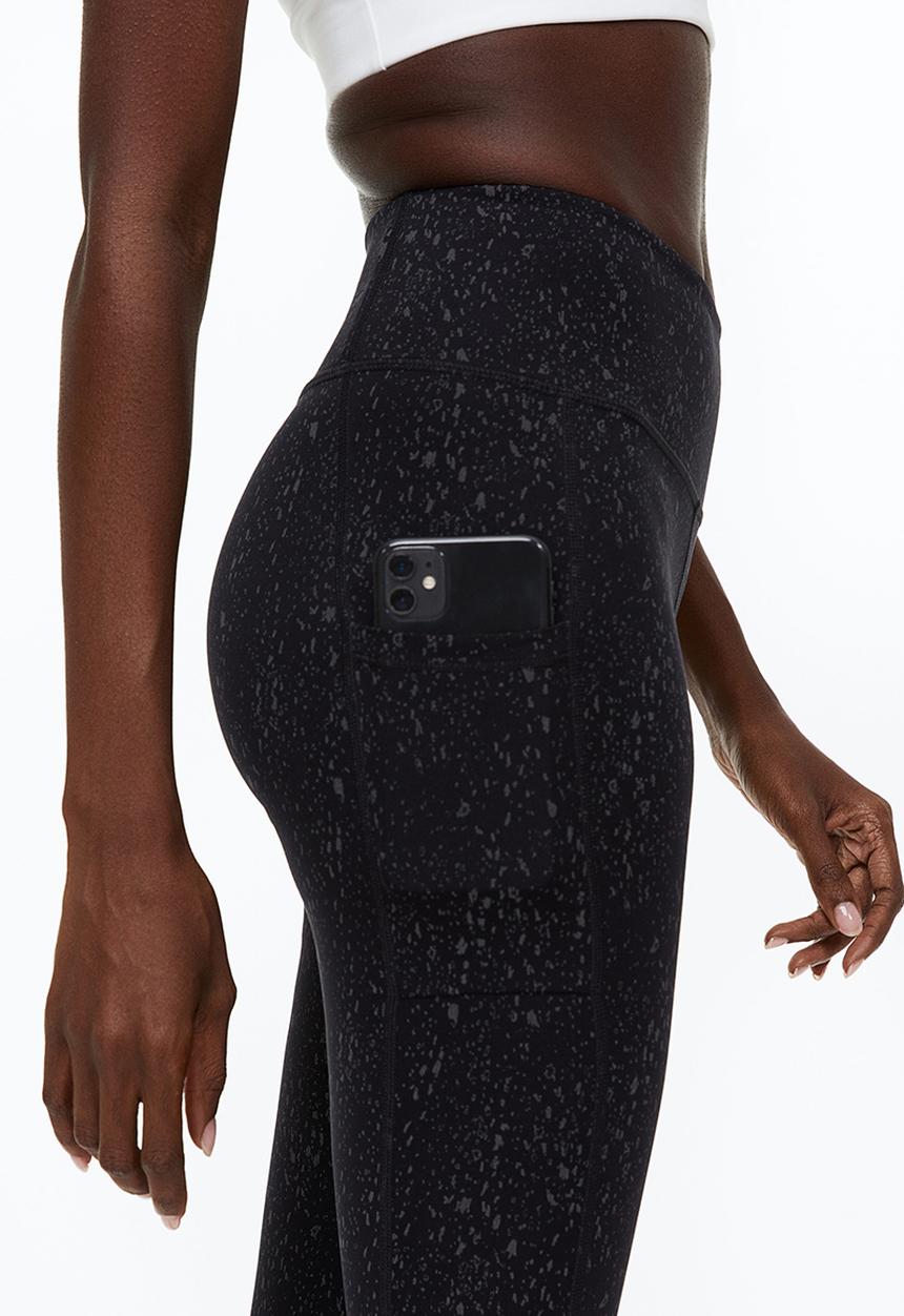 H&M - Reflective running tights - black/patterned