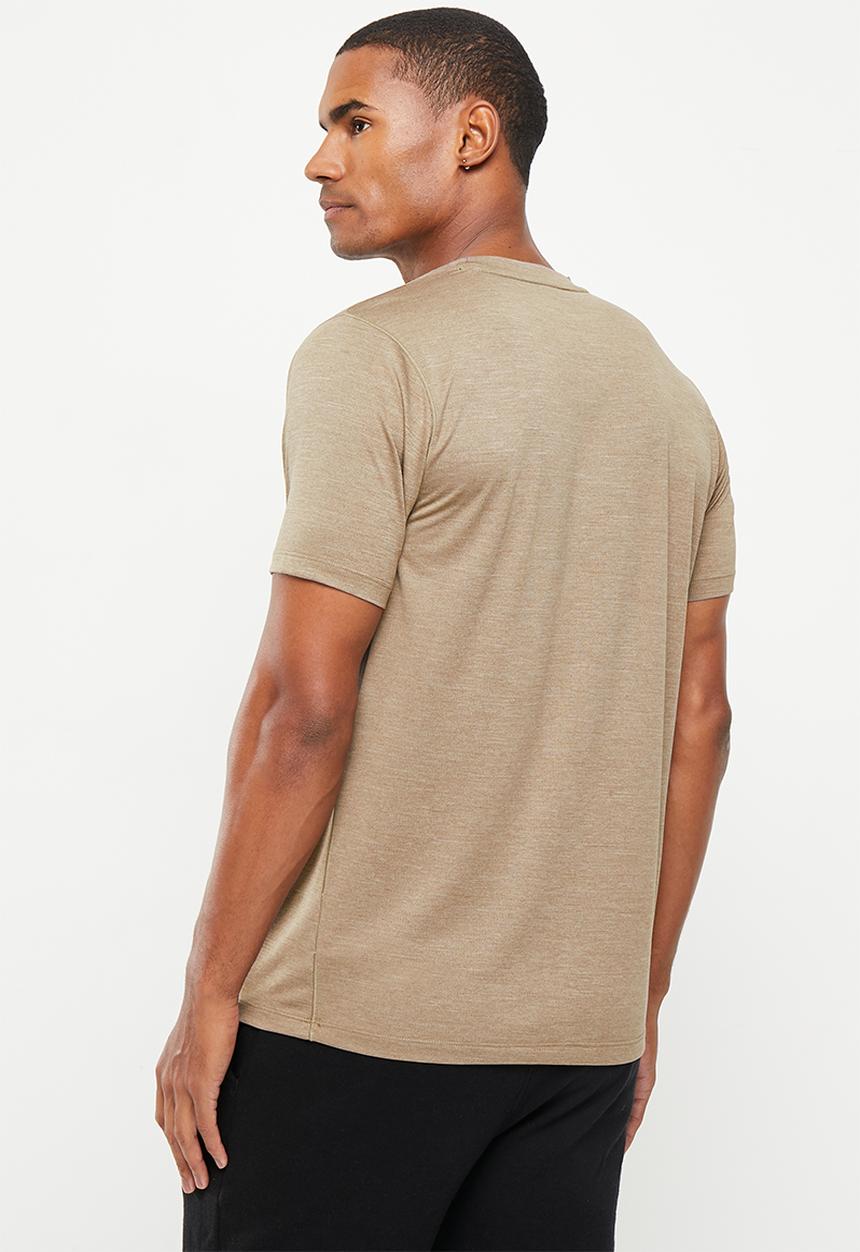 New Balance  - Tenacity short sleeve - mushroom heather