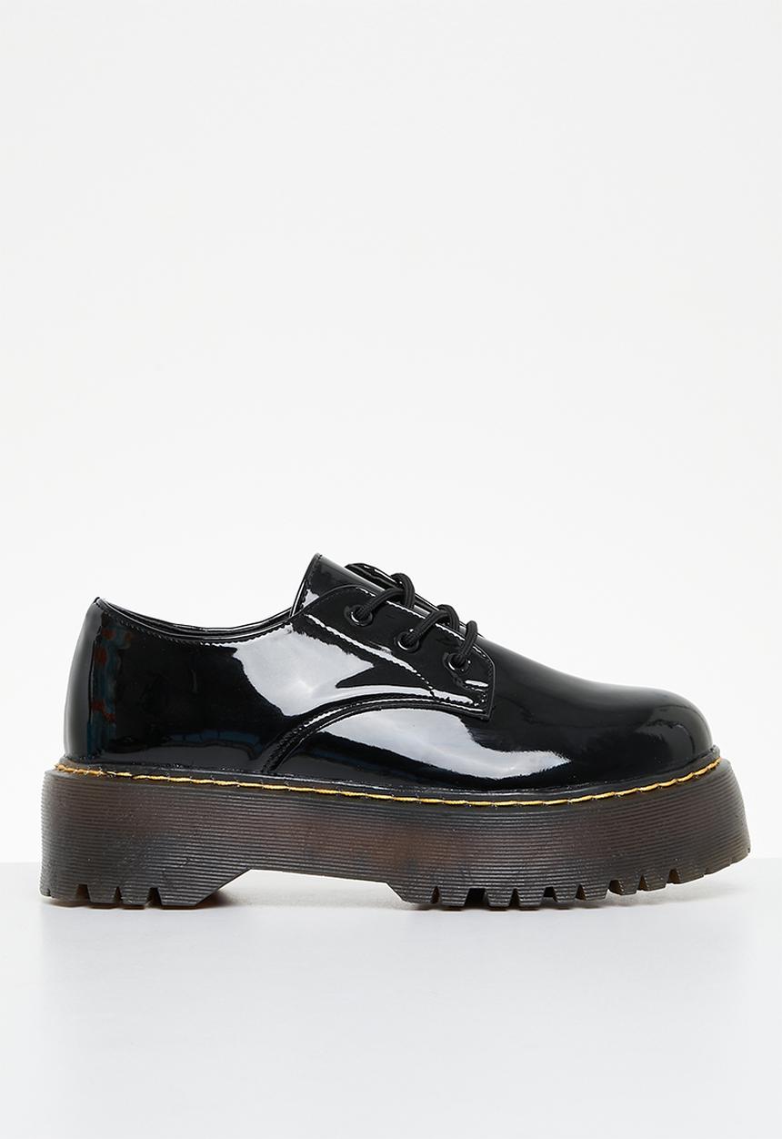 Jada - Smooth lace-up brogue - black