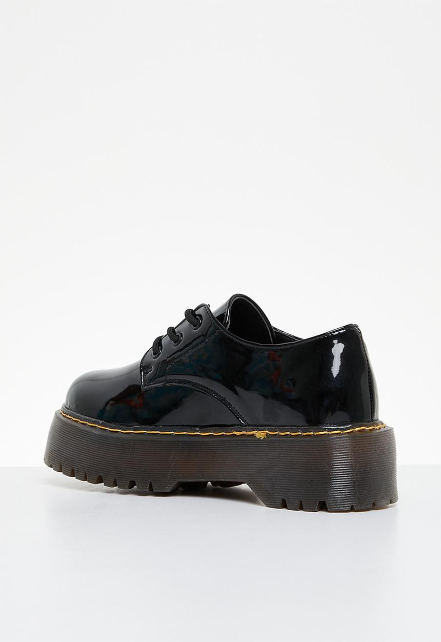 Jada - Smooth lace-up brogue - black