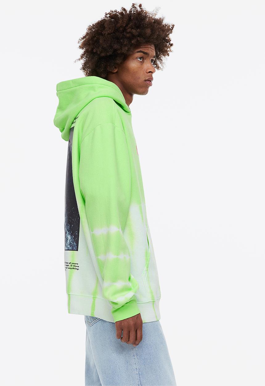 H&M - Relaxed fit hoodie - bright green/jaws
