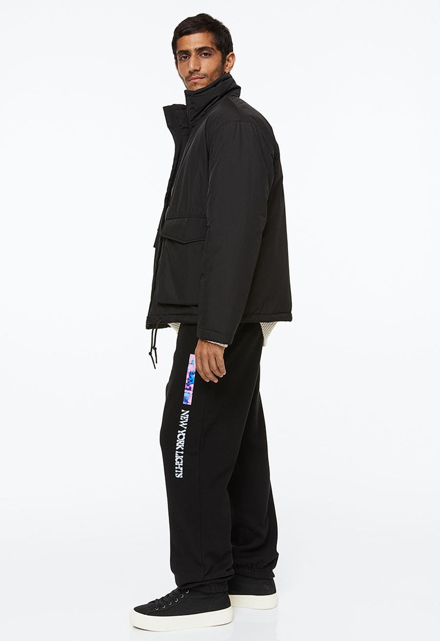 H&M - Relaxed fit sweatpants - black/new york lights