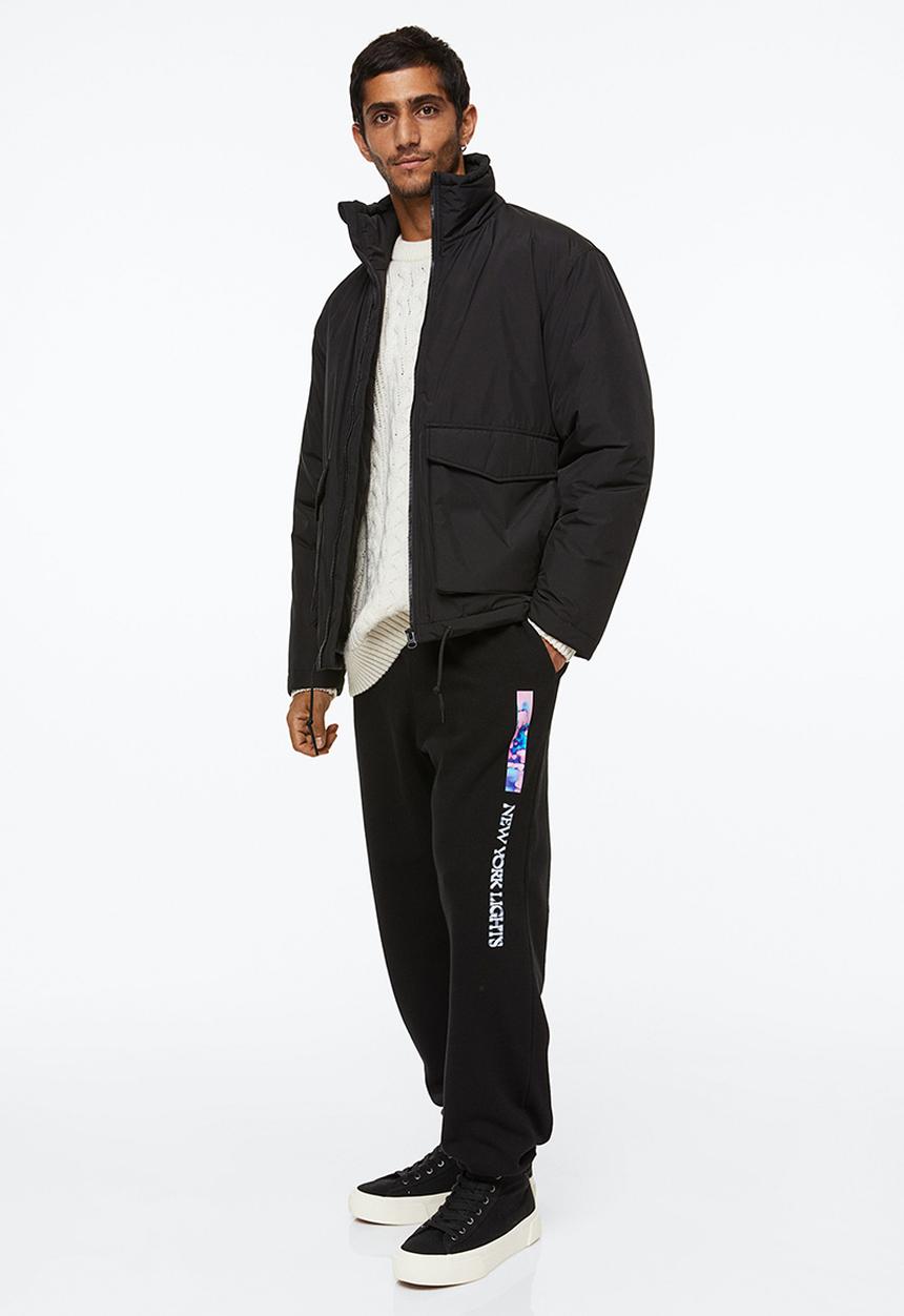 H&M - Relaxed fit sweatpants - black/new york lights