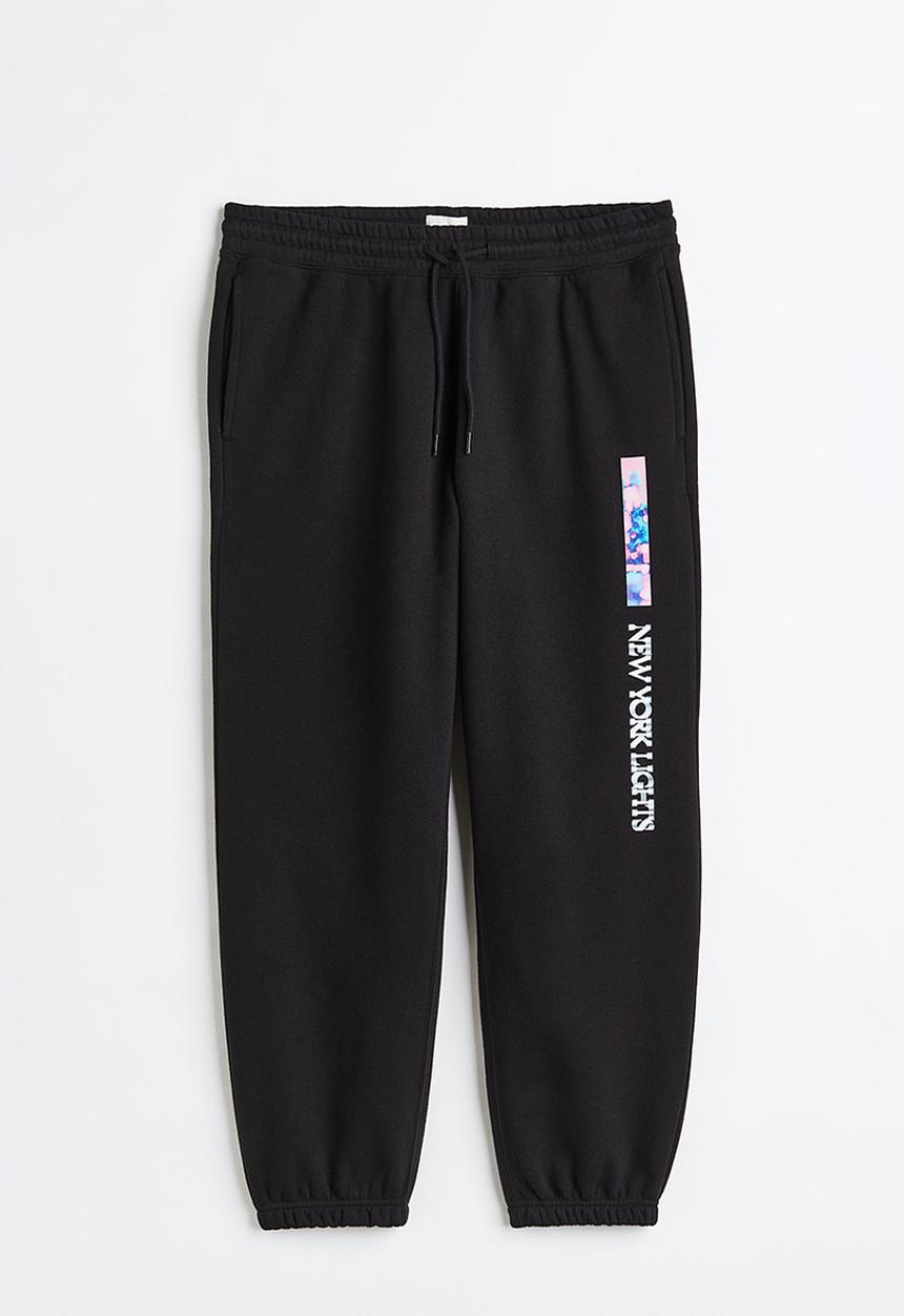 H&M - Relaxed fit sweatpants - black/new york lights