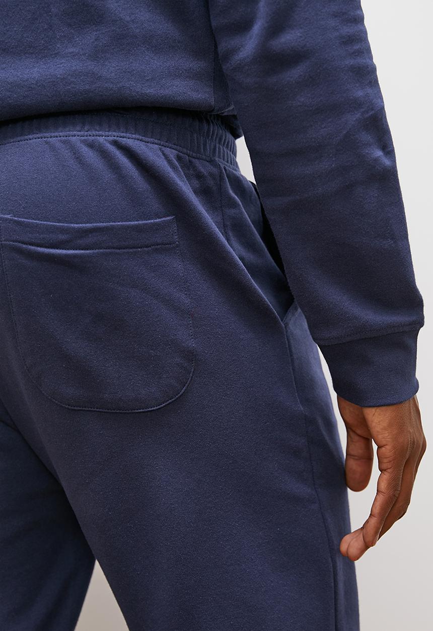 Lark & Crosse - Regular tapered open hem sweatpants - navy