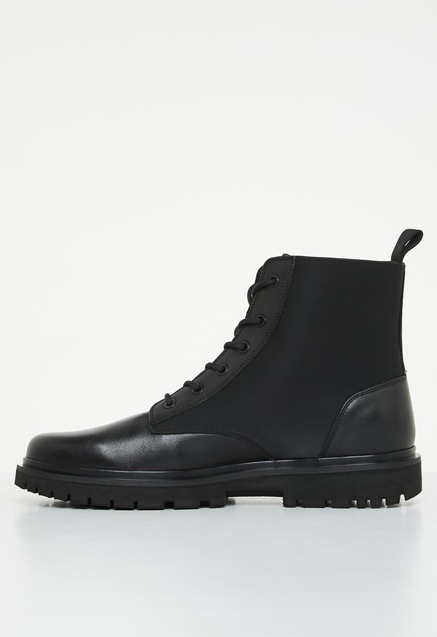 Calvin Klein - Lug lace up leather boot - black